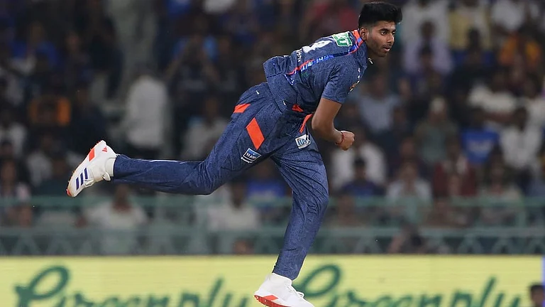Lucknow Super Giants Mayank Yadav bowls a delivery during the Indian Premier League cricket match between Gujarat Titans and Lucknow Super Giants in Lucknow, India, Sunday, April 7, 2024. - (AP Photo/Surjeet Yadav)